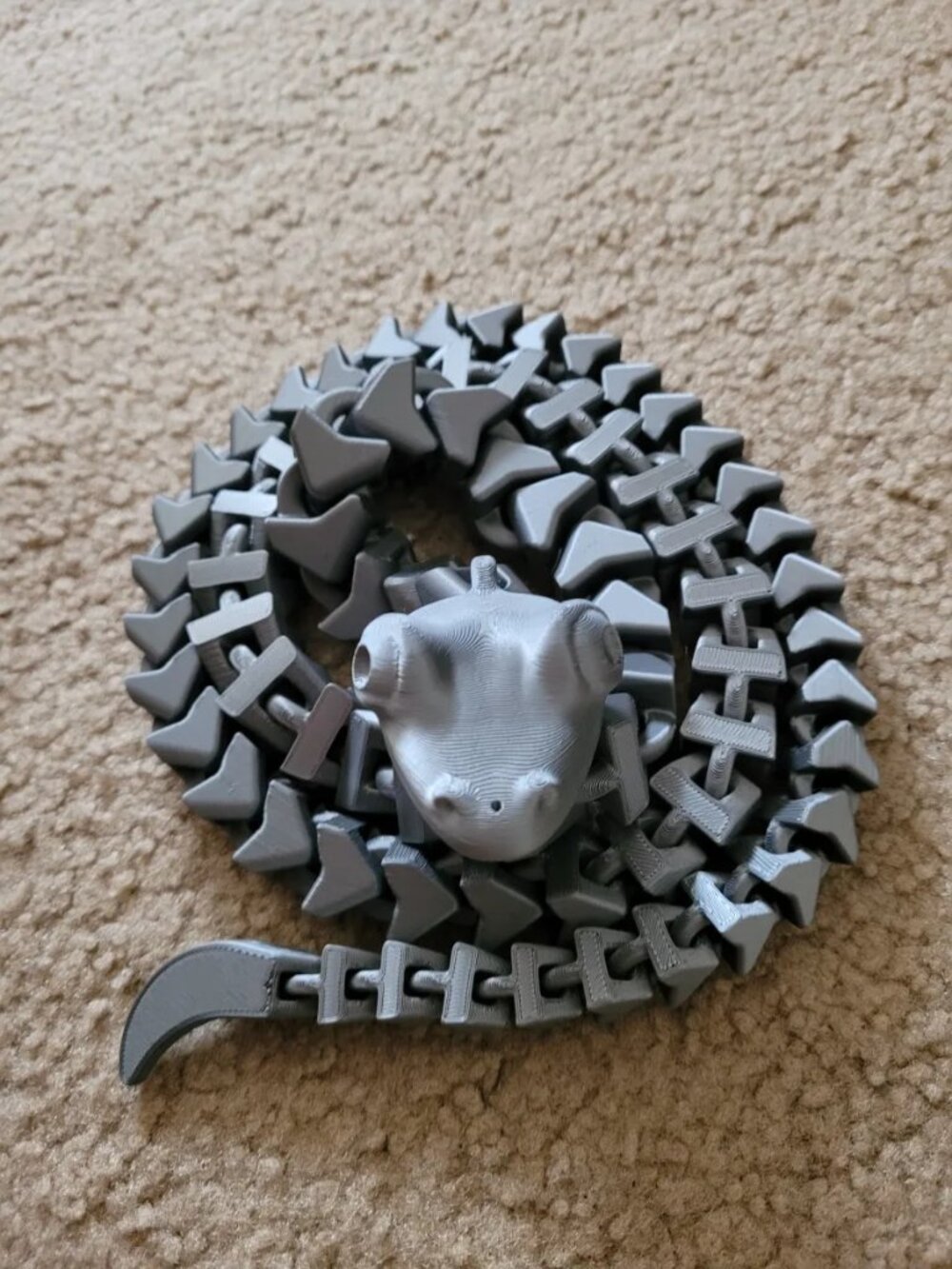 Flexible Snake with Hole For String (Cat Toy) is a beautifully designed 3D print